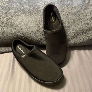 Black fabric clogs